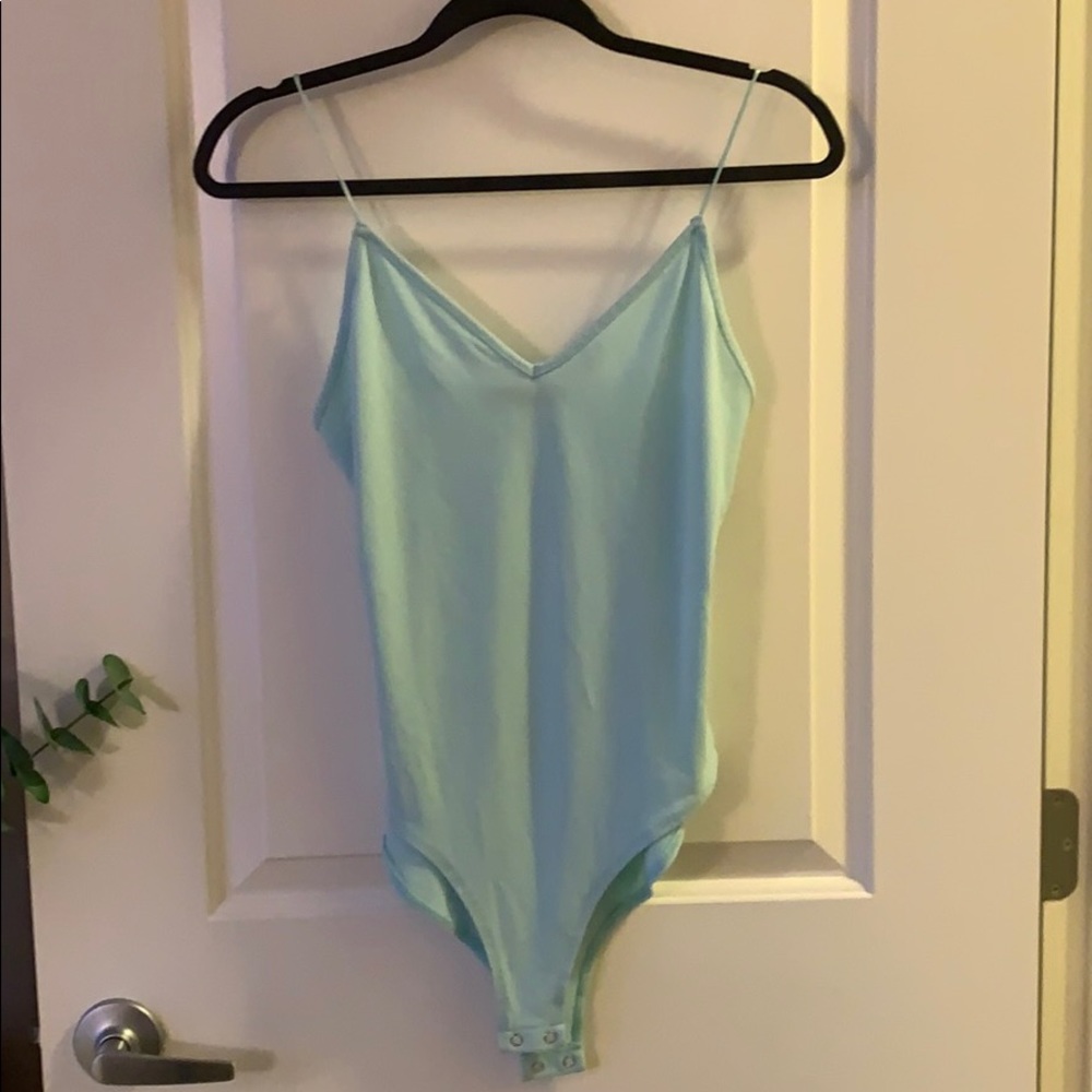 Mint women’s bodysuit, rarely worn